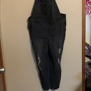 Black ripped leg overalls